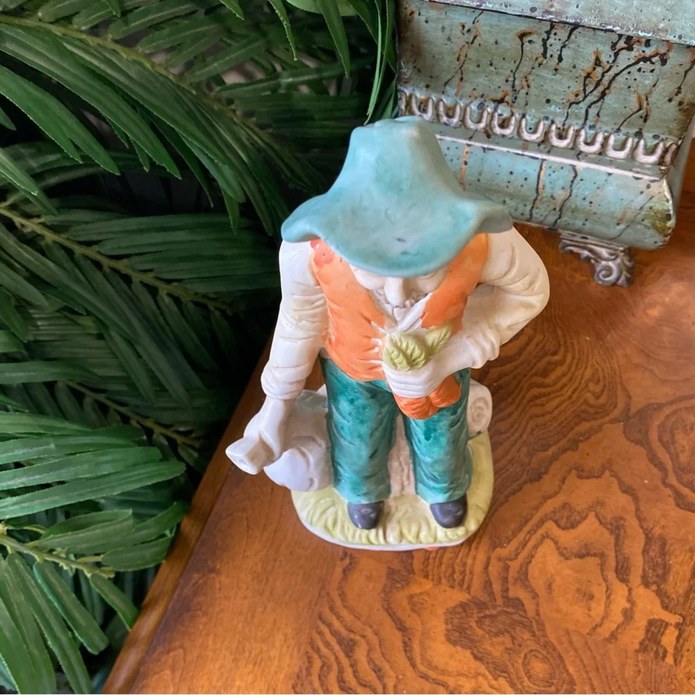 Vintage Ceramic Farmer Figurine in Green and Orange